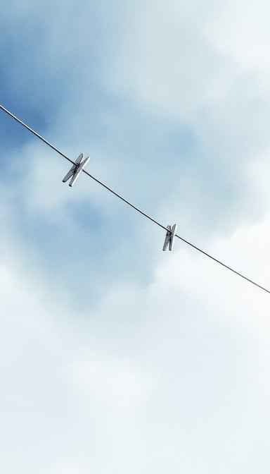 Clothespins Against Sky